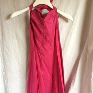 Pink halter top dress, A-line, knee length.